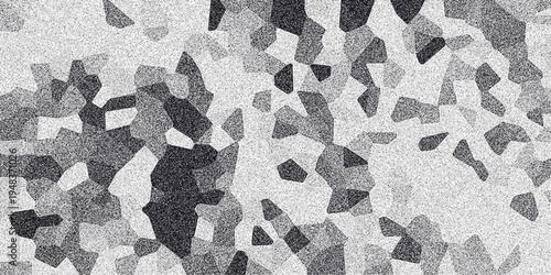 Geometric abstract grayscale background composed of irregular polygons with speckled noise, creating a mosaic-like texture for modern design applications