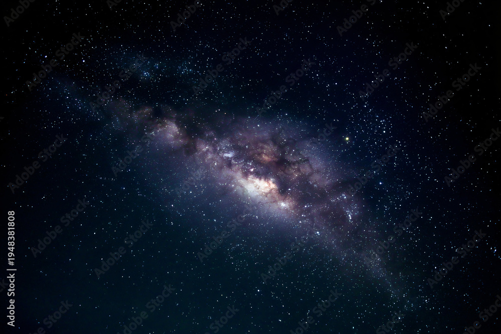 Fototapeta premium A mesmerizing view of the galaxy filled with stars and cosmic dust.