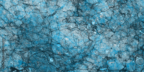 Cracked blue and grey concrete texture with intricate fissures and a weathered, distressed surface effect