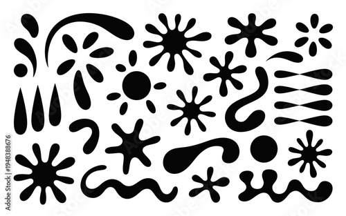 Collection of various abstract black ink splatters and drops on white background