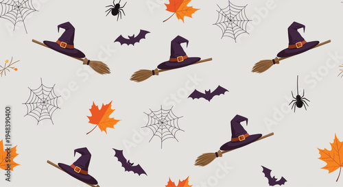 Seamless Halloween pattern with witch hats on broomsticks, flying bats, spider webs, and colorful autumn leaves.