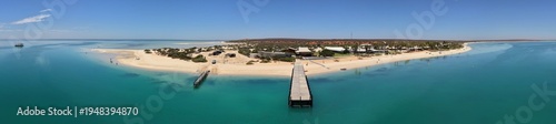 Wallpaper Mural Aerial View of Monkey Mia Dolphin Resort Beach, Jetties and Turquoise Water Along a Quiet Coastal Resort Village, Denham, Francois Peron NP, Shark Bay, Western Australia. Torontodigital.ca