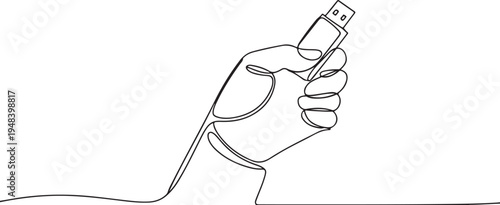 Hand holding aUSB drive with fingers curled flash drive