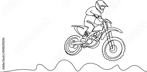 Motocross rider in mid-air jump on white background