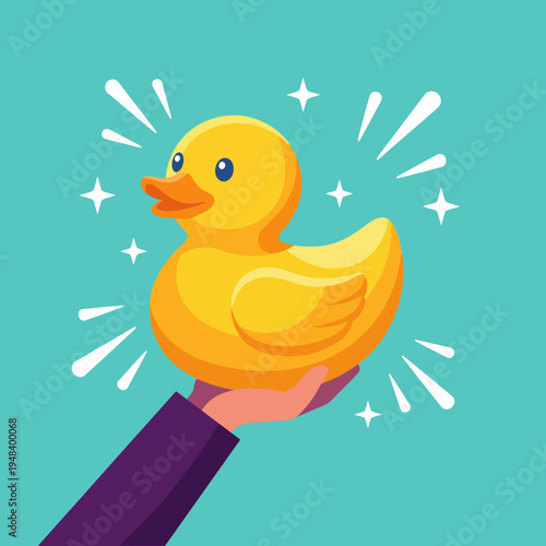 This cheerful image showcases a shiny yellow rubber duck being held up with beams of light, evoking happiness and playfulness, perfect for children and toy themes.