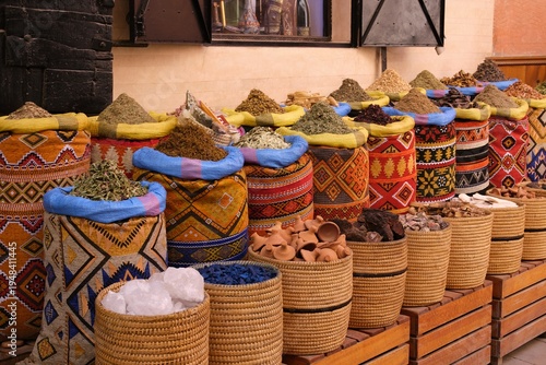 Moroccan spice market selling aromatic herbs in marrakech souk