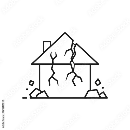 Damaged house with cracked walls and roof.