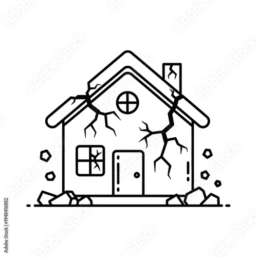 Damaged house with cracks and stones.