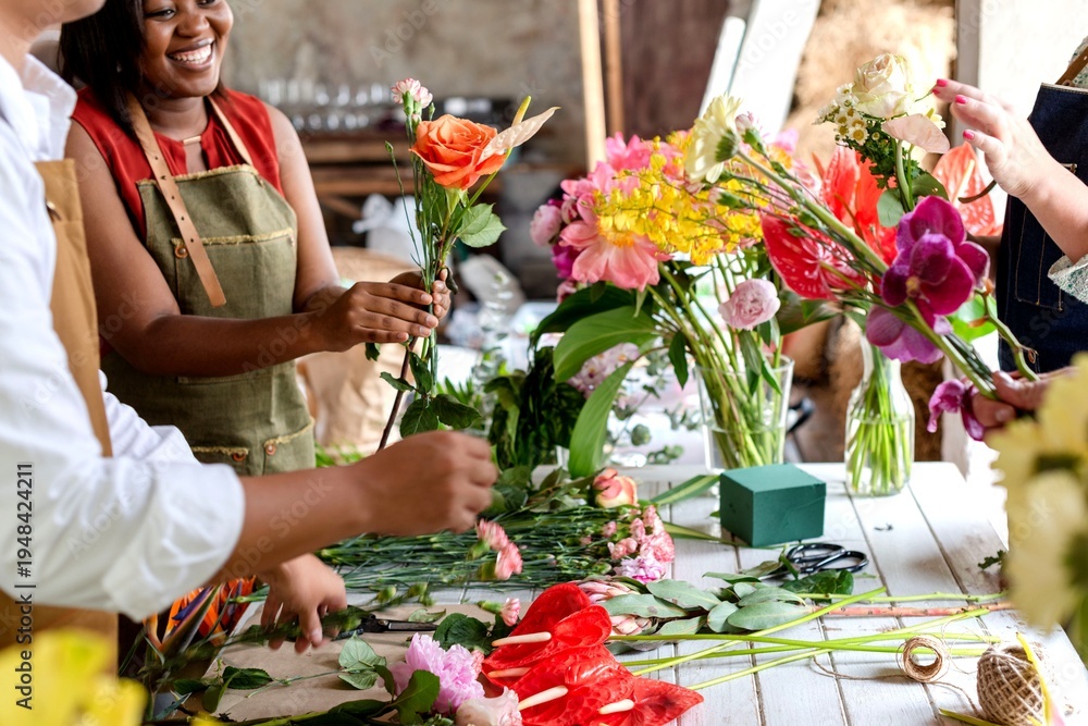 Fotografie Vibrant floral arrangement workshop scene.