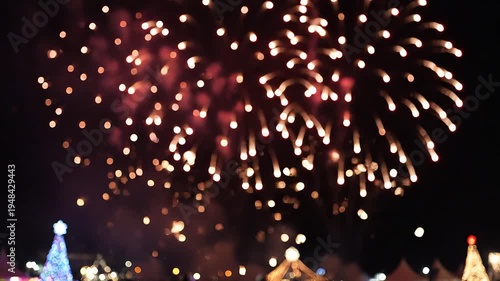 Spectacular Fireworks Display Illuminating the Night Sky Over a Festive Gathering.