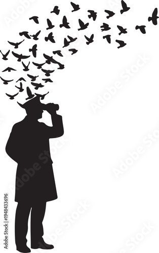 A silhouette of a person observing a flock of birds flying away from them.