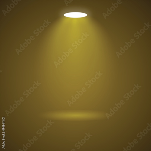 A single spotlight shining brightly in a dark room with a yellow glow and a circular light source