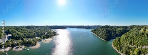 Wallpaper Mural Aerial View of the Lakeside Sunset Marina Resort on Dale Hollow Lake With Highway 111 Bridge, Boats and Forested Shoreline, Calm Water on a Sunny Day, Monroe, Tennessee, USA. Torontodigital.ca