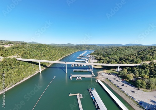 Wallpaper Mural Aerial View of the Lakeside Sunset Marina Resort on Dale Hollow Lake With Highway 111 Bridge, Boats and Forested Shoreline, Calm Water on a Sunny Day, Monroe, Tennessee, USA. Torontodigital.ca