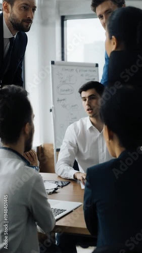 Business meeting in modern office space.