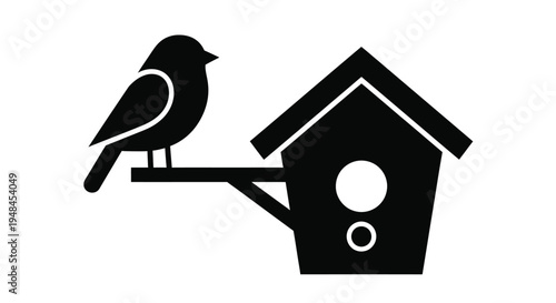 A small bird perches on a branch near a simple birdhouse