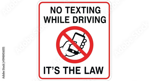 Warning sign prohibits texting while driving on road