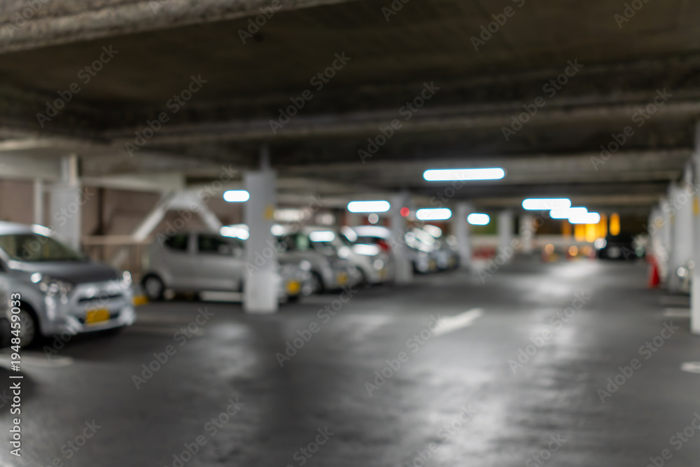 Obraz premium アウトフォーカスの地下駐車場背景