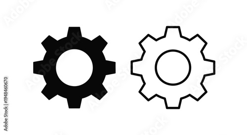 Two contrasting gears one dark and one light a striking silhouette