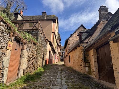 Traditional half timbered medieval house in Conques village, Aveyron, France
