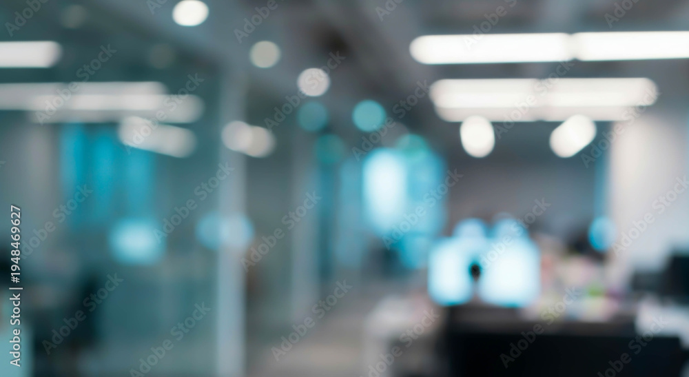 custom made wallpaper toronto digitalBlurred office interior showcases a modern workspace with computers, desks, and ambient lighting, creating a productive atmosphere that suggests business activities.