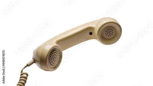 Foto Vintage beige telephone receiver with coiled cord, an isolated retro communicati