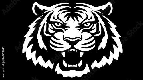 A fierce animal's detailed head silhouette against black, showing teeth, fangs, and fur