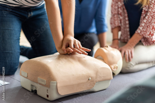 Obraz na płótnie CPR training with practice mannequin.
