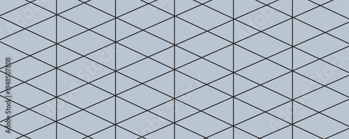 A gray surface featuring a modern geometric pattern composed of interconnected triangles. The design seamlessly blends simplicity with a sophisticated, contemporary style.