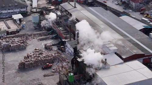Environmental pollution at the Istanbul paper recycling facility. Aerial view of paper waste. Drone footage highlighting the environmental problem.