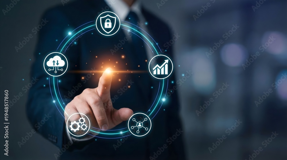 Fototapeta premium A futuristic business technology visualization showing a professional hand activating a circular system of large digital business icons orbiting around a central interaction point.