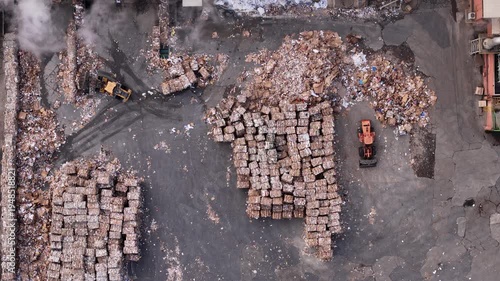 Environmental pollution at the Istanbul paper recycling facility. Aerial view of paper waste. Drone footage highlighting the environmental problem.