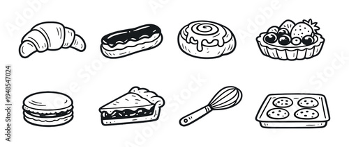 Assorted pastries and baking tools on gray background