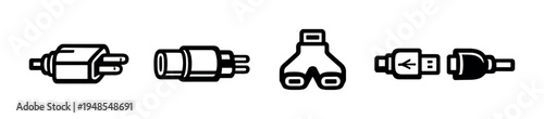 Various electrical plug connectors and adapters on dark background