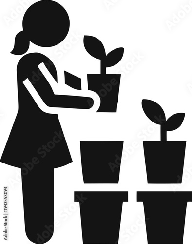 Woman Arranging a Collection of Potted Plants for a Growing Garden Display