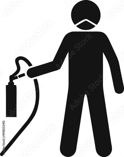 Worker wearing a protective face mask operating a specialized industrial sprayer or fumigation tool