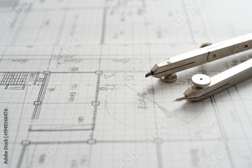 Obraz na plátně 一級建築士の設計製図でコンパスを使う手元の接写画像　Using a compass in drafting by hand