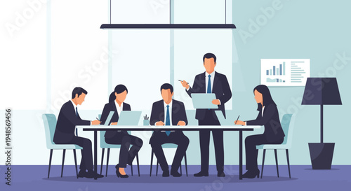 Professional colleagues collaborate on a strategic project during an important corporate meeting in a bright, modern office environment.