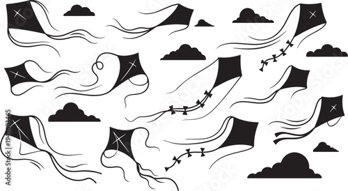 Kites flying high in the sky with clouds present