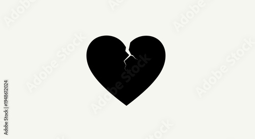 Black Broken Heart Silhouette on White Background - Symbol of Sadness and Heartbreak