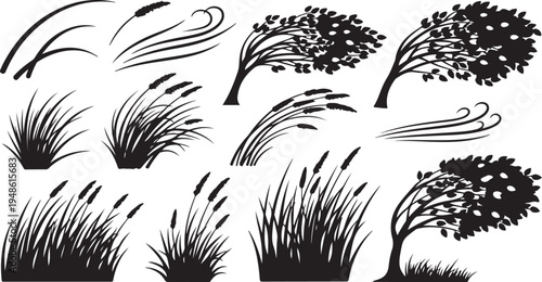 Black and white silhouettes of trees and grass blowing