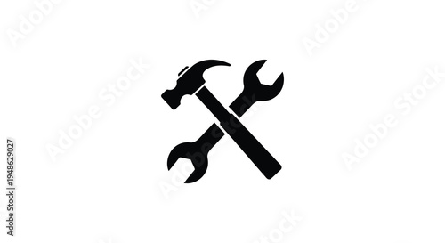 Black silhouette of a hammer and wrench crossed on a white background