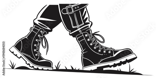 a pair of black hiking boots on grassy terrain Vector