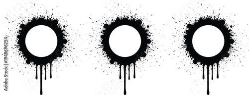 Set of black paint drips in circular shapes with splatter effects for creative design and abstract artSet of black paint drips in circular shapes with splatter effects for creative design and abstract