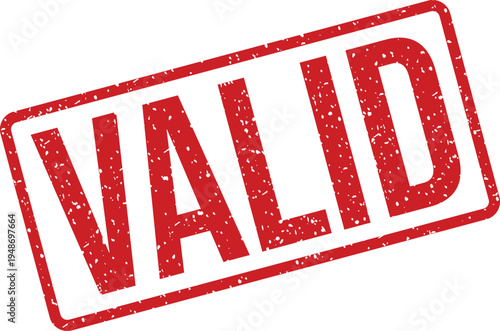 Red rectangular rubber stamp clearly showing the word VALID with a grunge texture on a clean white surface