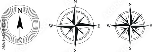 Three black and white compass rose designs with directional indicators navigation north