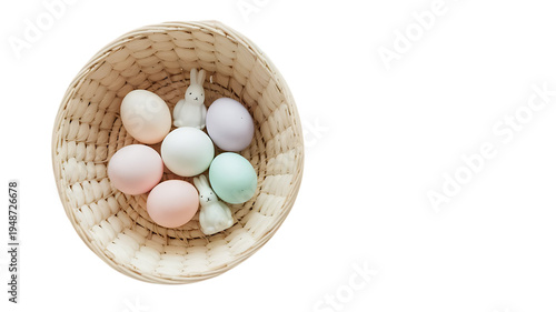 Top view of pastel Easter eggs in a round wicker basket isolated on transparent background PNG
