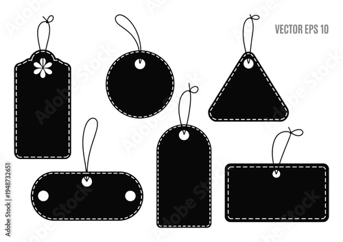 Collection of Black Tags with Strings on White Background