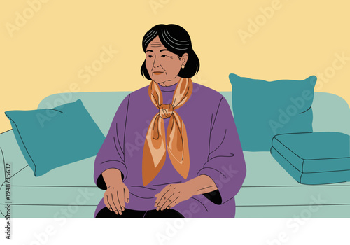 An elegant senior woman sits on a sofa, wearing a silk scarf and a purple shirt. She exudes grace and sophistication. A classic, serene portrait.