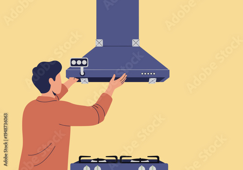 A man installs a kitchen ventilation system. Clear, focused image showcasing installation process. Modern kitchen setting. Professional installation.